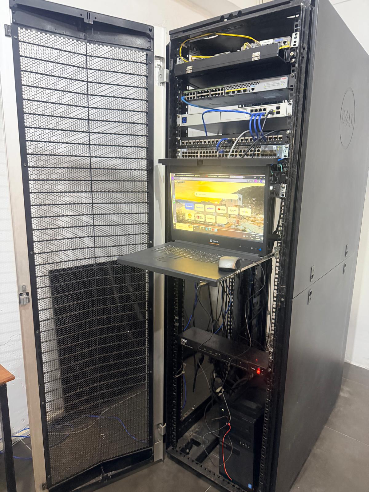 Spectrum-built enterprise network rack with managed switches and patch panel
