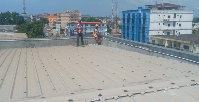Rooftop link install overlooking the city skyline