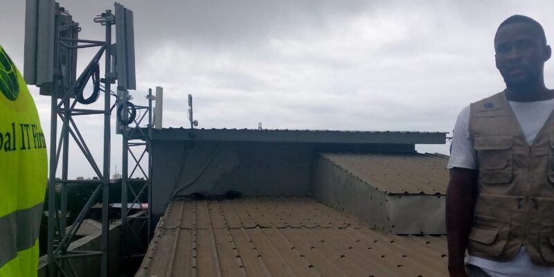 Spectrum technician on a sectorized antenna tower